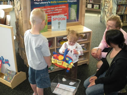 Kids and parents learn by participating in Racing to Read, the Library's early learning program.
